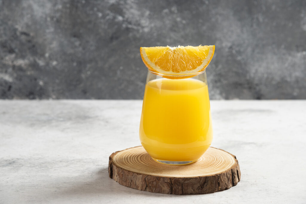 How do you make mango juice and preserve it?